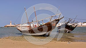 SUR, OMAN: Dhows traditional sailing and fishing boats at the Old Harbor in Ayjah