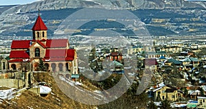 Surb Vardan church and Caucasus Mountains