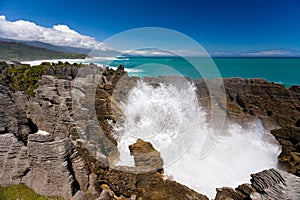 Surf in blowhole Pancake Rocks of Punakaiki, NZ