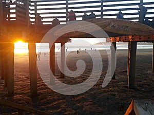 Surf Board sign Pismo Beach pier sunset