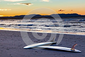 Surf boards at a beach photo