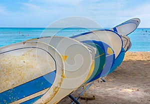 Surf Boards stacked in line on Hawaiian Beach