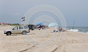 The surf fishing beach by Gordon\'s Pond beach area in the summer near Rehoboth Beach, Delaware, U.S