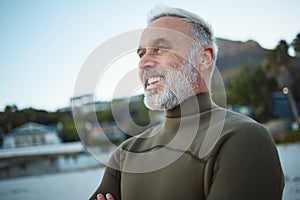 Surf, happy and senior man at the beach for peace, calm or freedom of the mind during holiday in Rio de Janeiro Brazil