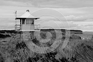 A surf lifesavers tower on the dunes of an Australian surf beach