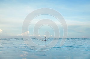 Surf In Ocean. Surfing Girl On Surfboard Swimming In Sea. Surfer In Blue Wetsuit Practicing On Waves.