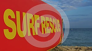 Surf rescue surfboard on beach