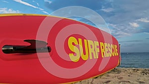 Surf rescue surfboard on beach