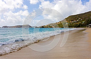 The surf rolling ashore in the windward islands