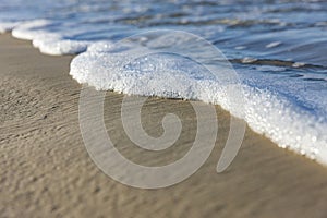 Surf on the sandy beach