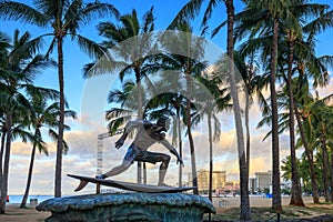 Surf statue on Queen's Beach area of downtown Waikiki Honolulu, Oahu, Hawaii