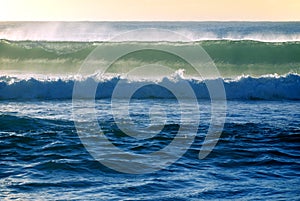 Surf wave breaks in the ocean