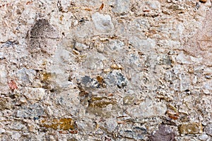 Surface of ancient wall of natural stone