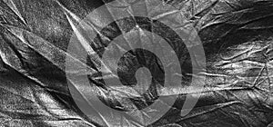 Surface of black leatherette texture.