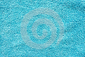 Surface of blue microfiber cloth, macro textile pattern background