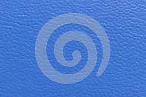 The surface of the blue old worn dermatin