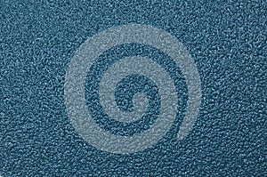 Surface of blue sandpaper