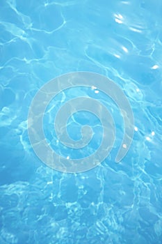 Surface of blue swimming pool. Background of water in swimming pool