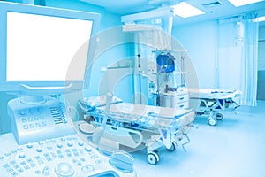 Surface blur View ultrasound machine and monitor LCD and bed Of Empty Emergency Room,view of a couple of empty beds in an