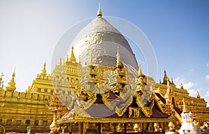 blurry Sunligth in The golden Shwezigon Pagoda Shwezigon Paya Repair in Bagan, Myanmar Burma