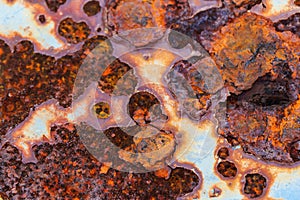 The surface of the broken metal rusts. photo