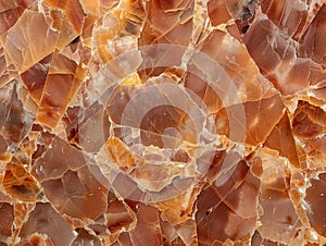 Surface of brown quartz broken in many pieces by multiple fissures creating amazing pattern in rusty tones. Scales of