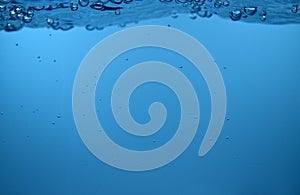 Surface Bubbles under Blue water background