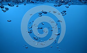 Surface Bubbles under Blue water background