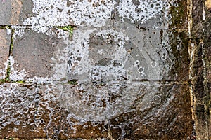 The surface of the cobblestones is covered with ice