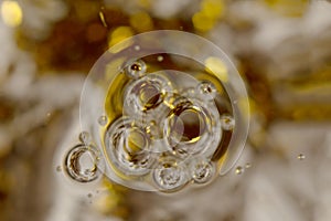 The surface of the cosmetic product has bubbles. blurred background. soft focus