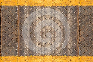 Surface of diamond rusty dirty weathered iron plate with yellow line for construction site