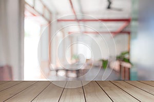 The surface on the empty wooden table and the blur background