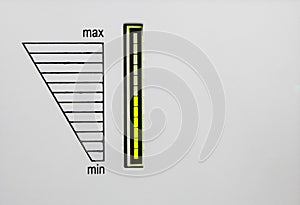 The surface of equipment with green led indicator and scale from min to max. Scale of load of alternating current AC