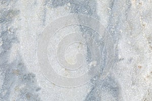 The surface of a gray marble slab. Antiquity, history and construction. Background. Space for text