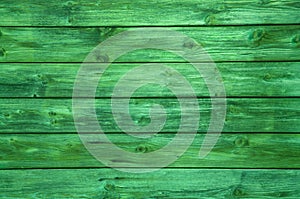 Surface of a green wooden background.