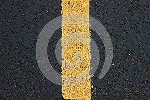 Surface grunge rough of asphalt Seamless tarmac dark grey with yellow line on the road and small rock Texture Background