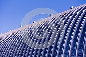 The surface of a industrial metal roof. Abstract background