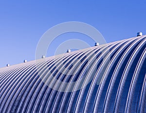 The surface of a industrial metal roof. Abstract background