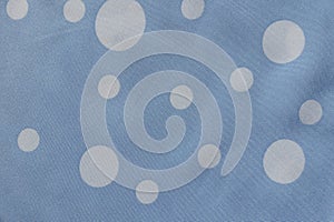 Surface of light blue rayon with polka dot pattern photo