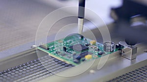 Surface Mount Technology Machine places elements on circuit boards