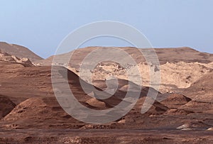 The surface and mountains on Mars, with the sky. Elements of this image were furnished by NASA