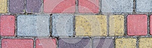 Surface of multi-colored paving slabs. Beautiful pattern, background close-up