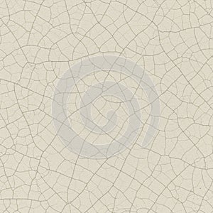 A surface with a network of fine cracks creating a pattern resembling crazing. The