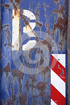 Surface of an old blue rusty container