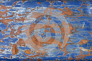 Surface of an old blue rusty container