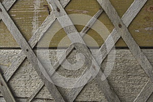 Surface from old boards upholstered with a plaster lath