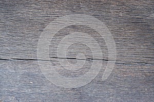 The surface of an old weathered wooden oak slab. Aged wood texture. Oak wood texture, background. Natural wood slab texture Wood