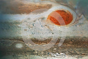 The surface of the planet Jupiter, with a large spot, background texture. Elements of this image were furnished by NASA