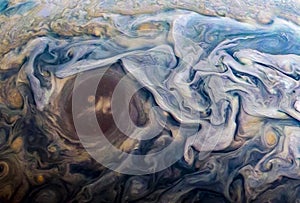 The surface of the planet Jupiter, with a large spot, background texture. Elements of this image were furnished by NASA