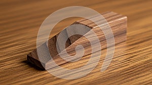 Surface it rests on has a similar wooden finish complementing the